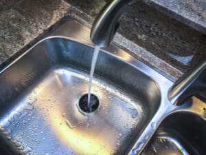 Stainless steel sink with garbage disposal