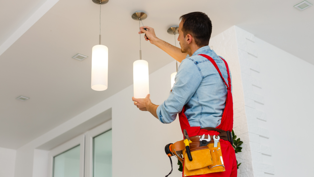 Electrician installing a light in St. Louis